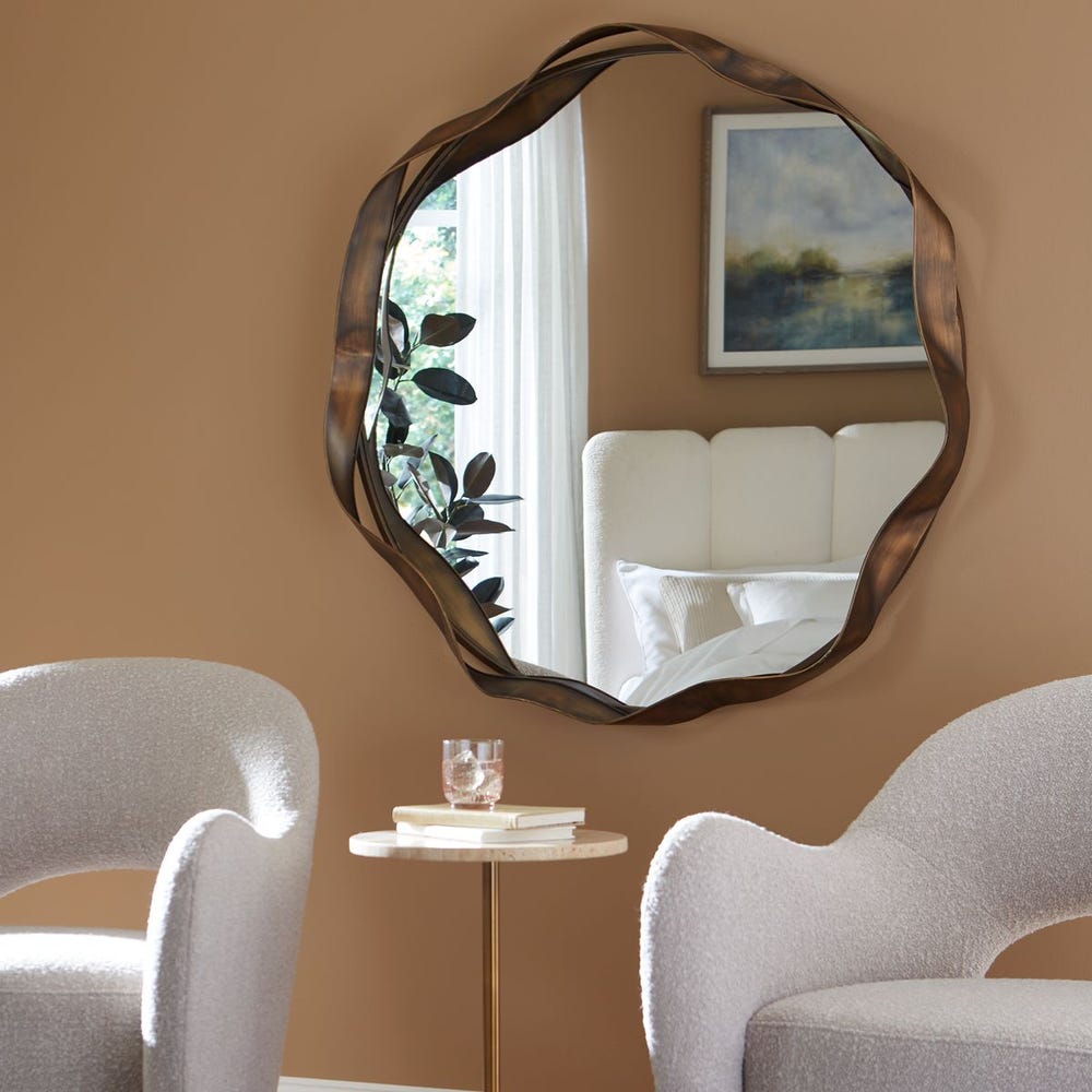 the Uttermost Catch the Wave wall mirror is available in Edmonton at McElherans Furniture + Design